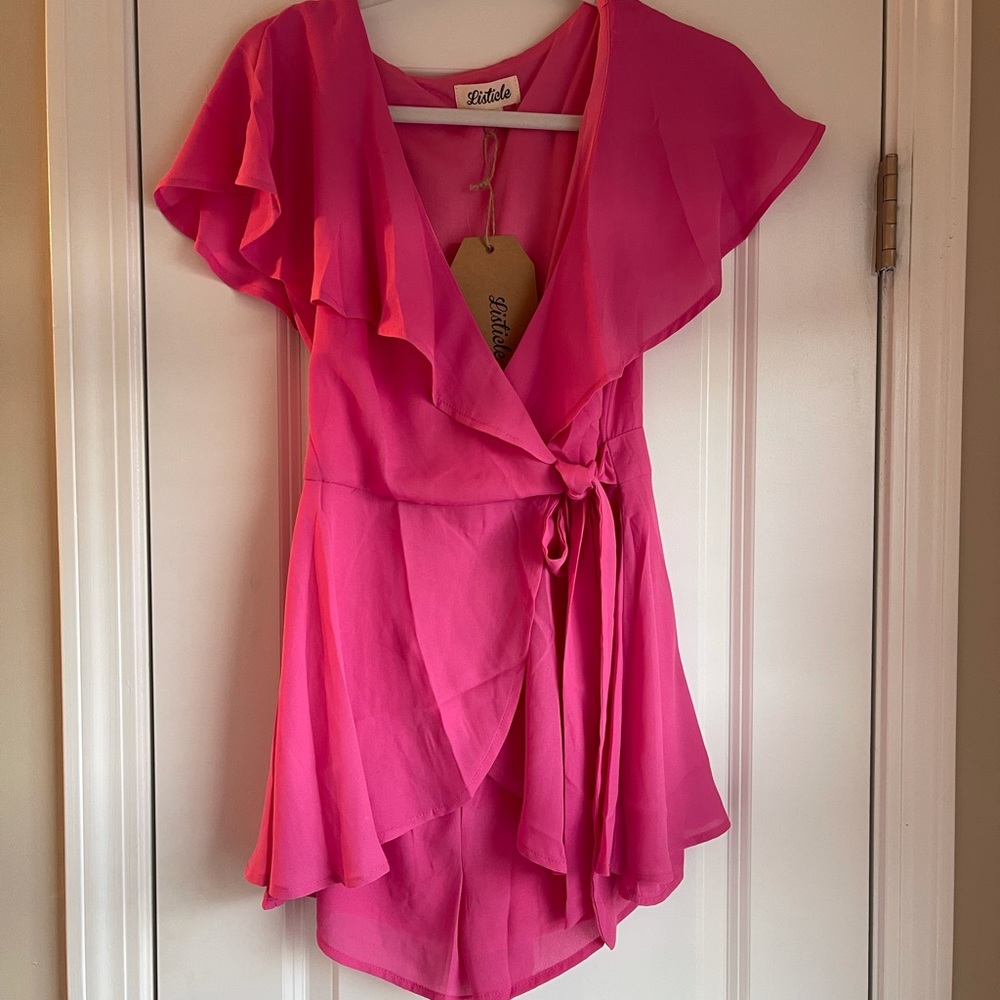 Super cute romper with tags!